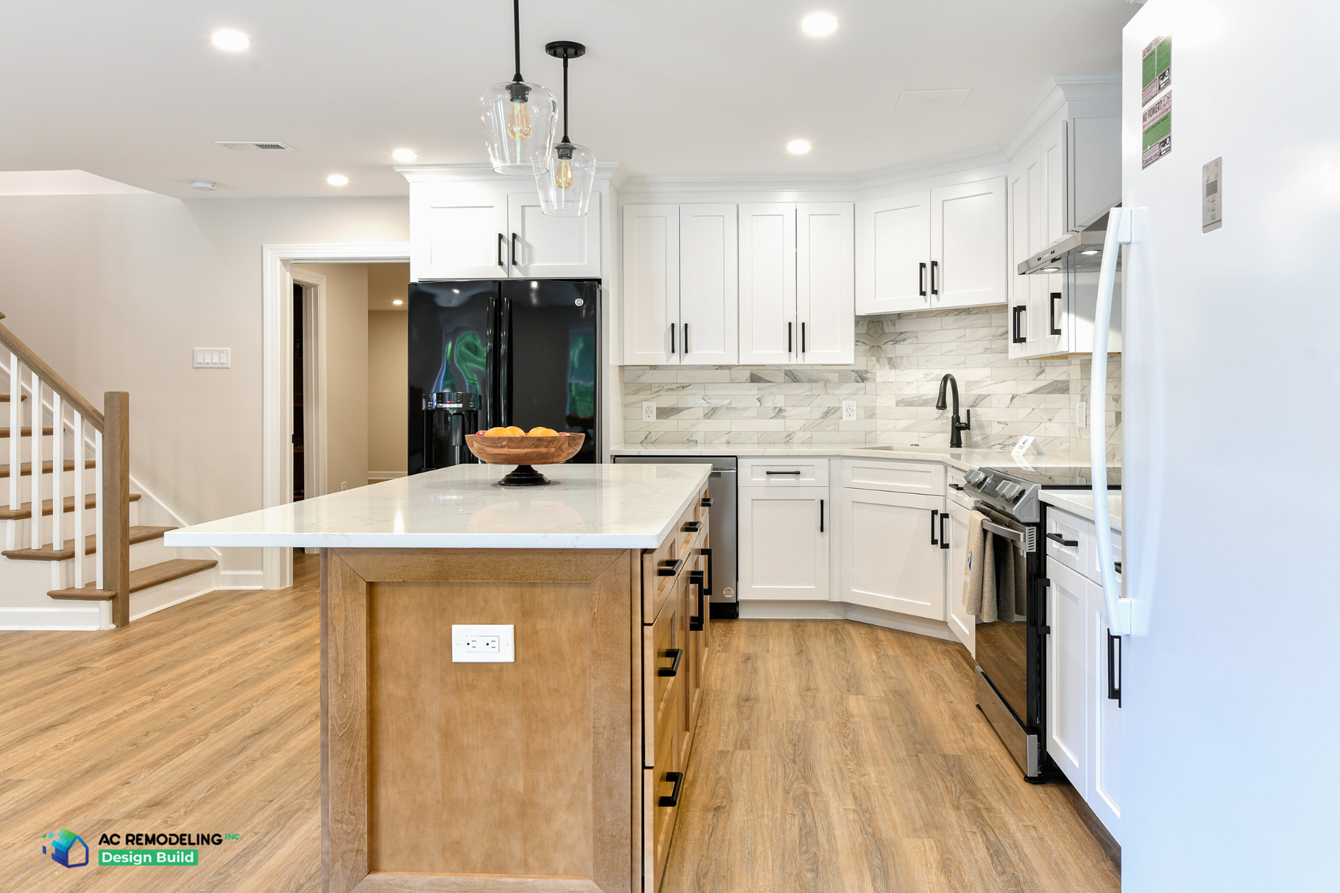 Custom kitchen island with seating and a clear walkway behind the stools