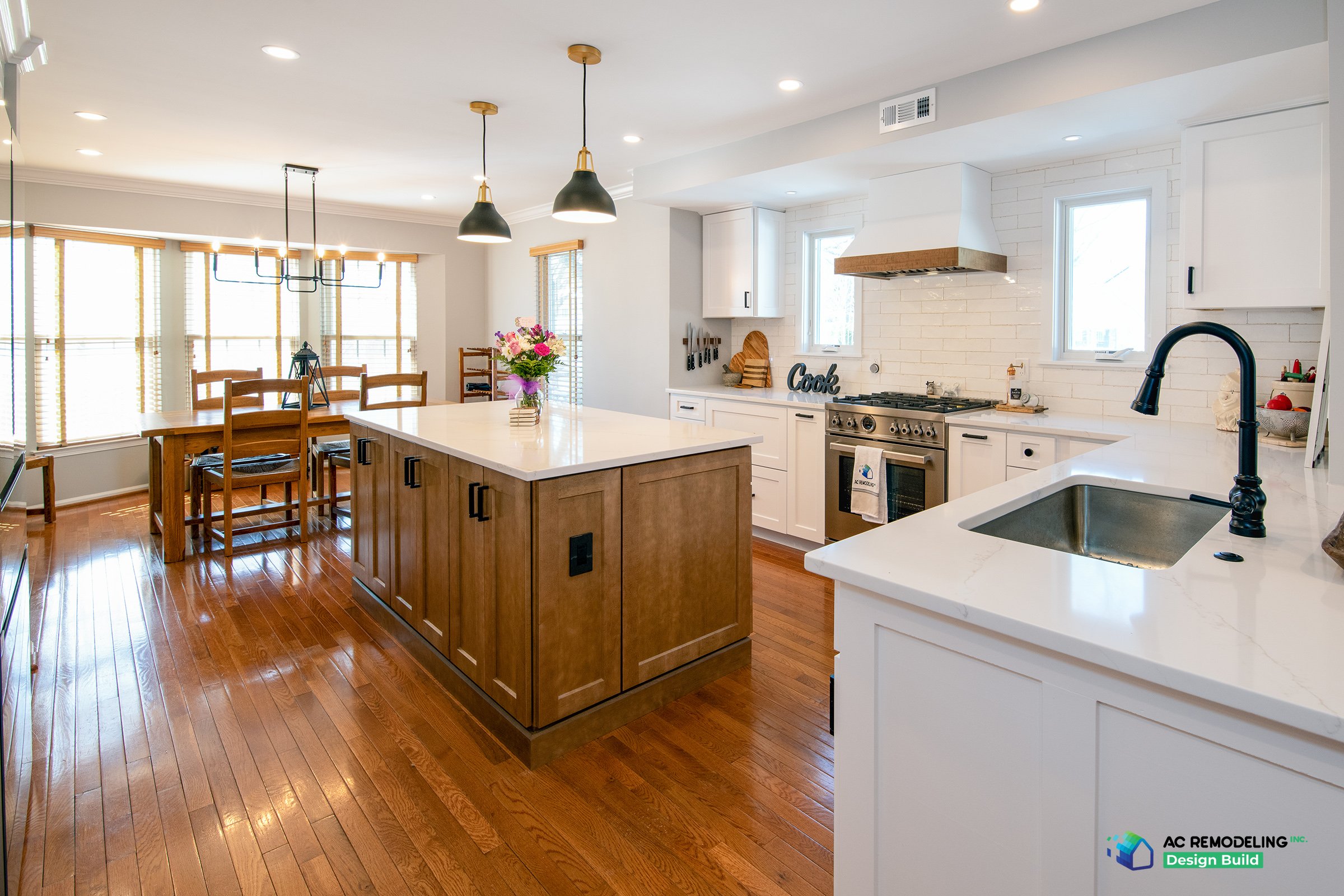 Cleaning products, scrubbing brushes, and gloves neatly arranged on the kitchen table for easy access and organization.