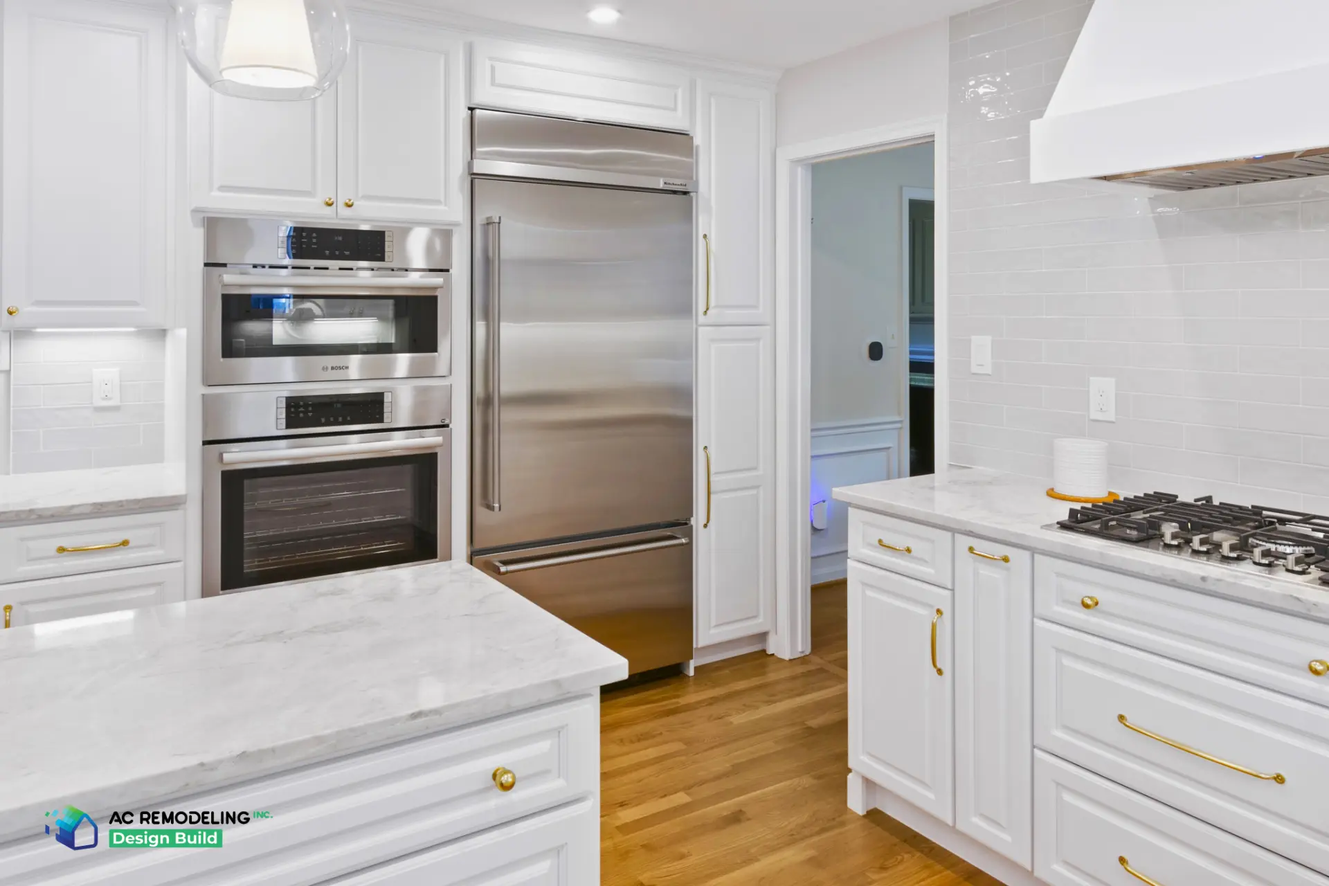 Bosch wall ovens and gas cooktop with subway backsplash